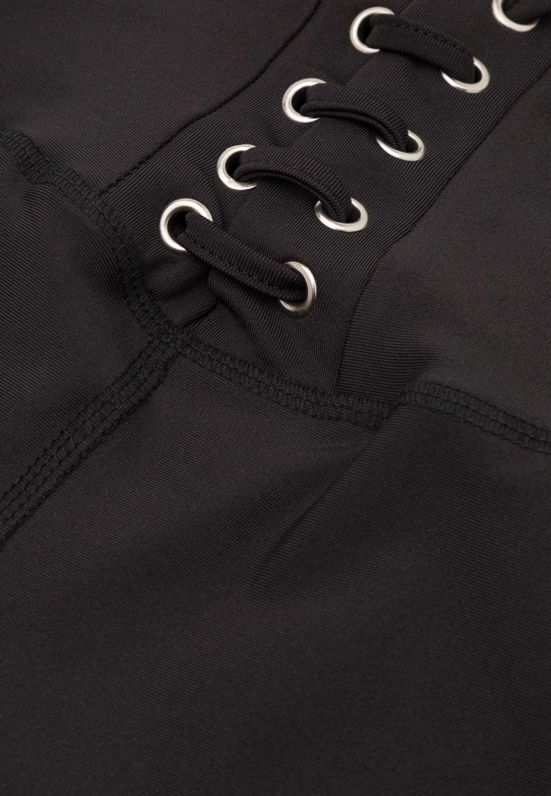 Nahaufnahme der 211 Extra High Waist Leggings von Lismina in Schwarz mit überkreuzten Schnürsenkeln und genähten Metallösen.